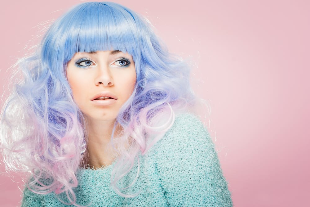 Pastel lavender hair style, soft wavy look inspired by celebrities like Hilary Duff and Kylie Jenner