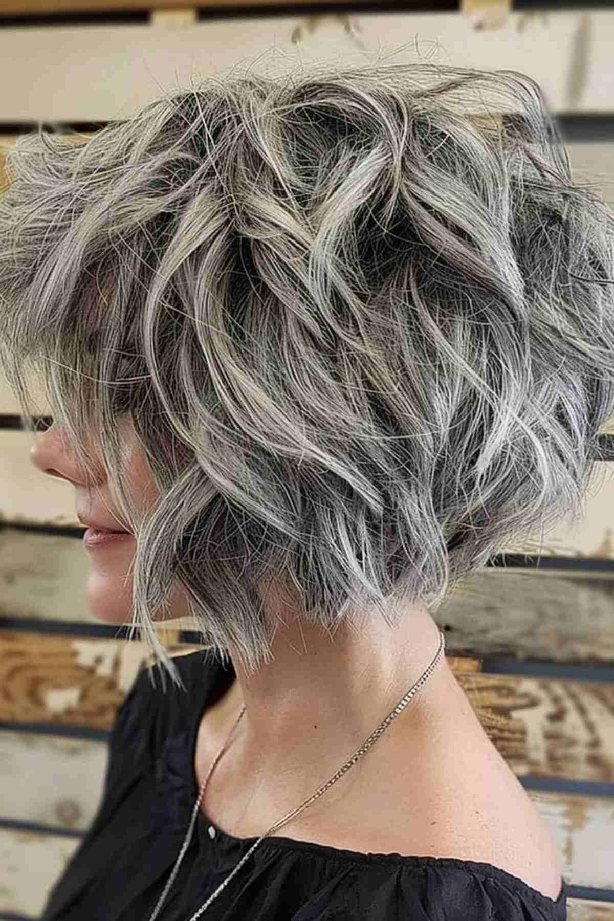 Pastel lavender hair style, soft wavy look inspired by celebrities like Hilary Duff and Kylie Jenner
